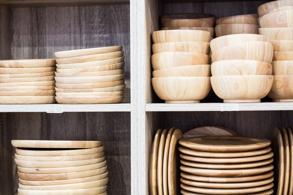 Reusable plates and bowls in cabinet 