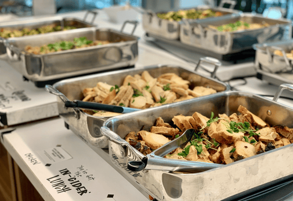 Catering lunch line with pans of food